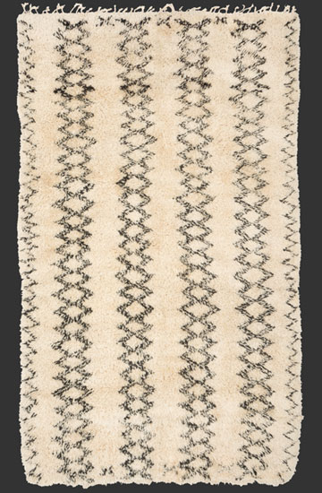 TM 2096, Beni Ouarain rug with unusual dense structure + a rare vertical design variant, north-eastern Middle Atlas, Morocco, 1990s, ca. 335 x 205 cm (11' x 6' 10''), high resolution image + price on request







